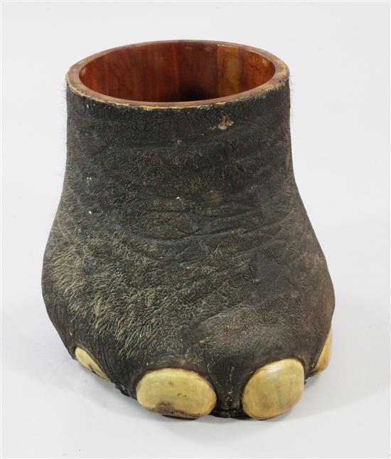 A late 19th century / early 20th century elephants foot waste paper basket, 17in.